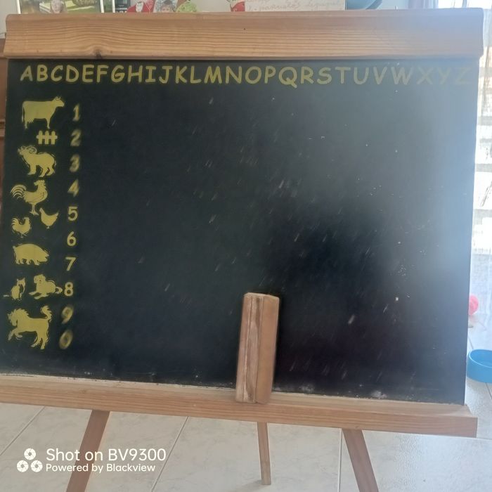 O quadro giz de criança.