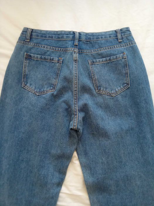 Новые джинсы с дырками