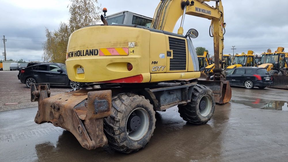 колісний єкскаватор New Holland MH SITY, 2010 року