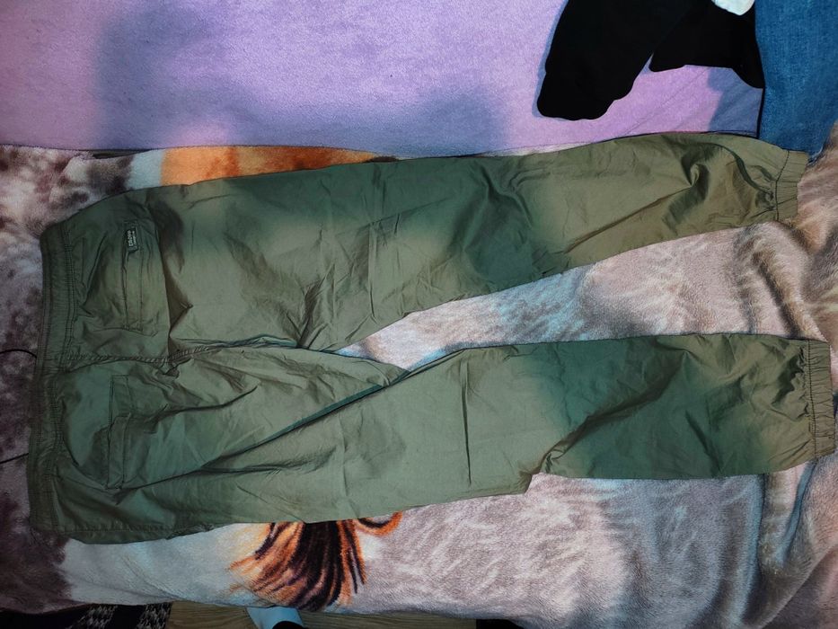 Nowe spodnie zielone Cropp męskie 32 L