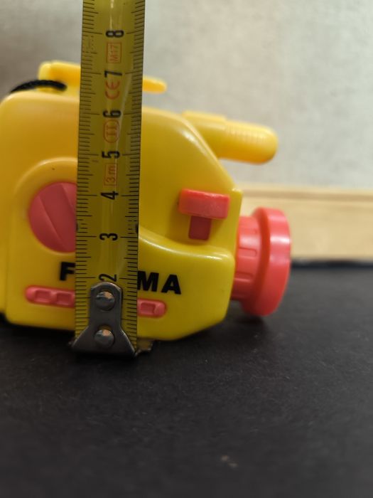 Brinquedo Câmera Fatima Amarela e Laranja.