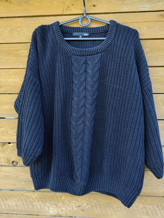 Sweter z warkoczem