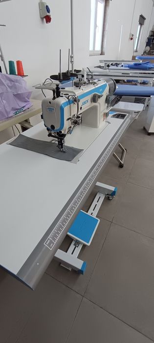 Máquina costura , triplo arrasto jack