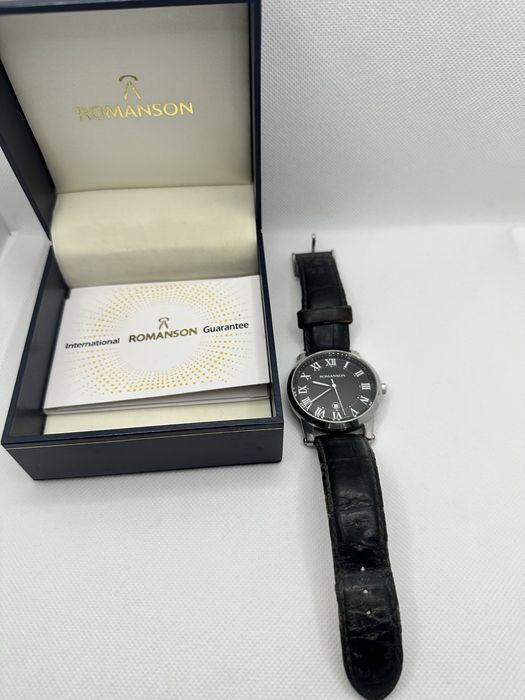 Продам Часы Romanson