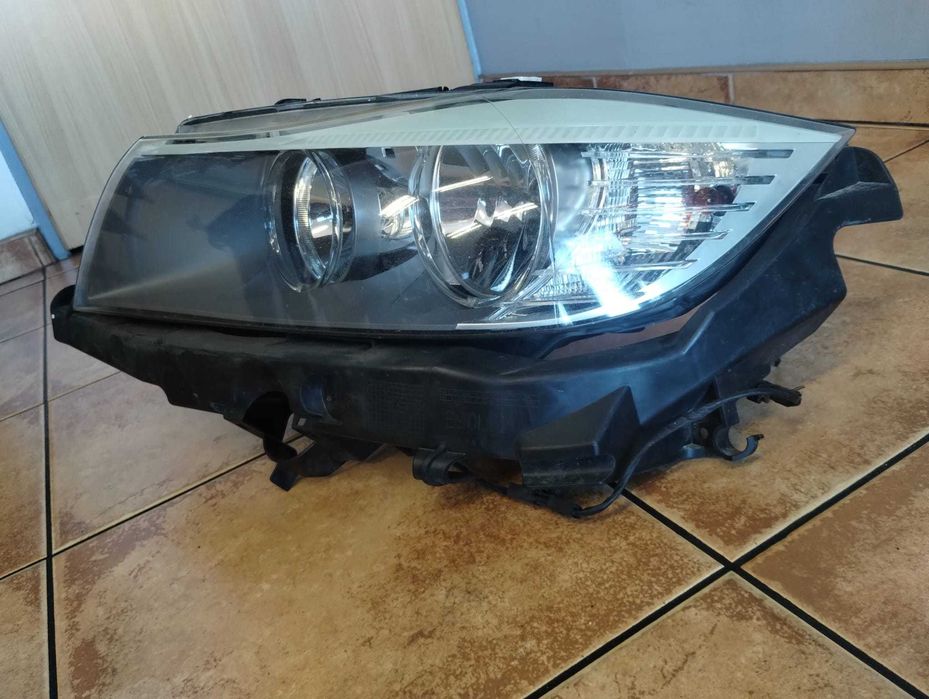 Lampa przód przednia lewa zwykła BMW E91 E90 LIFT,  89318911