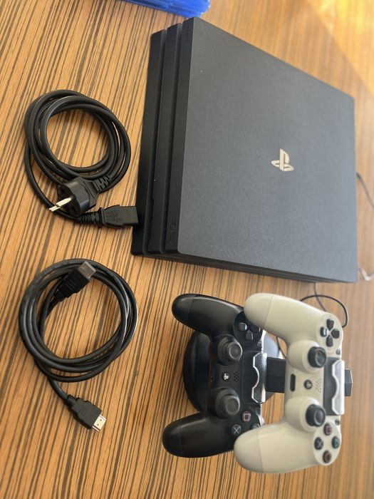 PS4 Pro 1TB + 2 Comandos + 5 Jogos