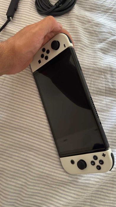 Nintendo Switch OLED + 2 Jogos + Garantia + Seguro + Fones