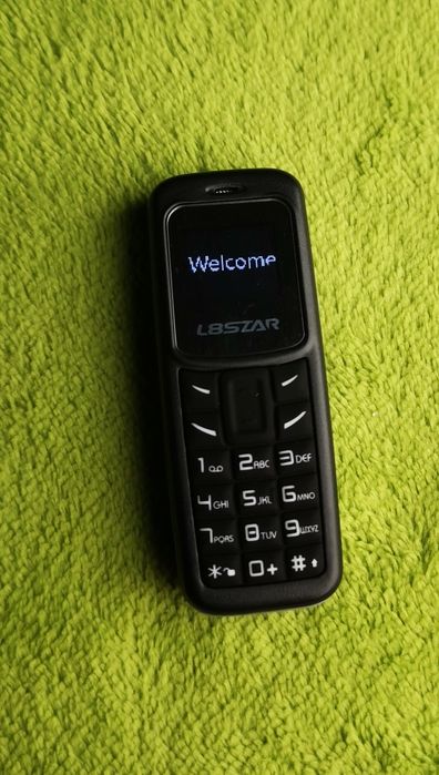 Mini telefon komórkowy na kartę SIM