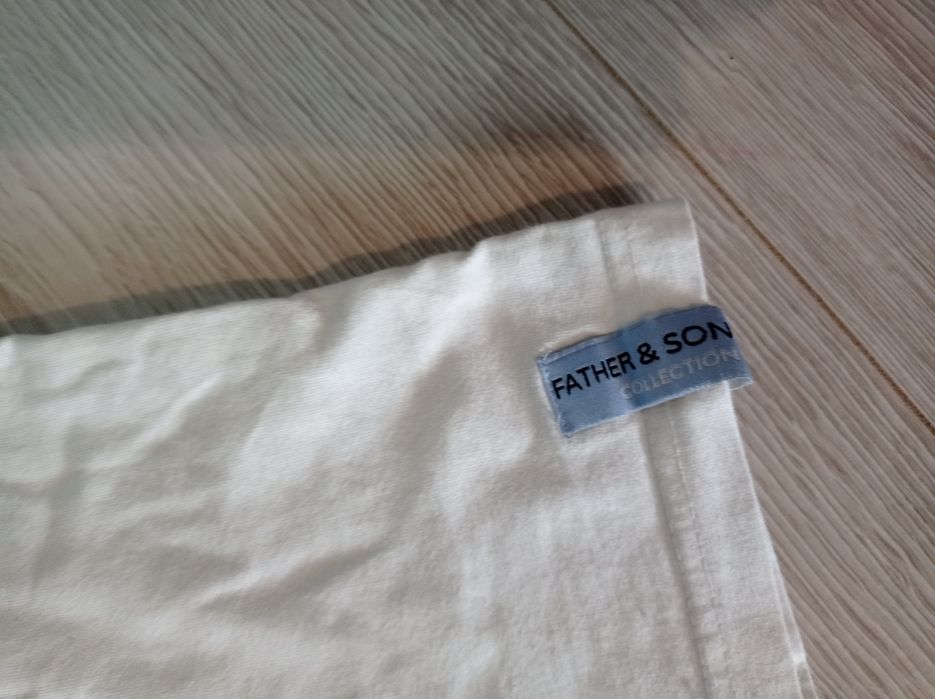 Biała bluzka z numerem 110/116