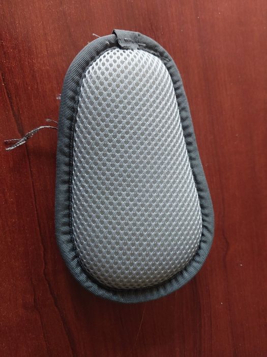 Ochraniacz klamry pasów w przyczepce rowerowej Qeridoo (uszkodzony)