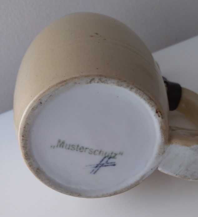 Caneca de cerveja em porcelana Musterschutz
