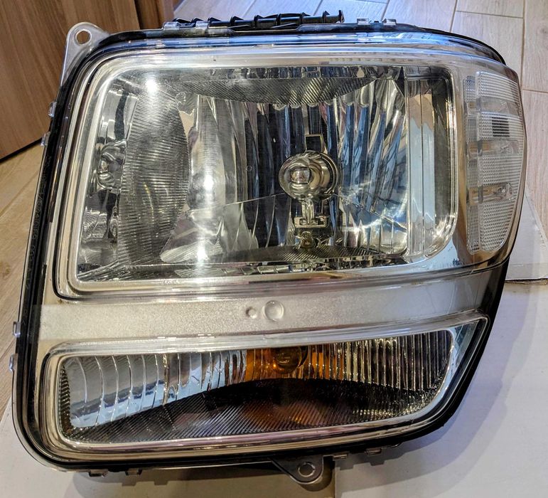 Фара Dodge Nitro європейська ліва оригинінал