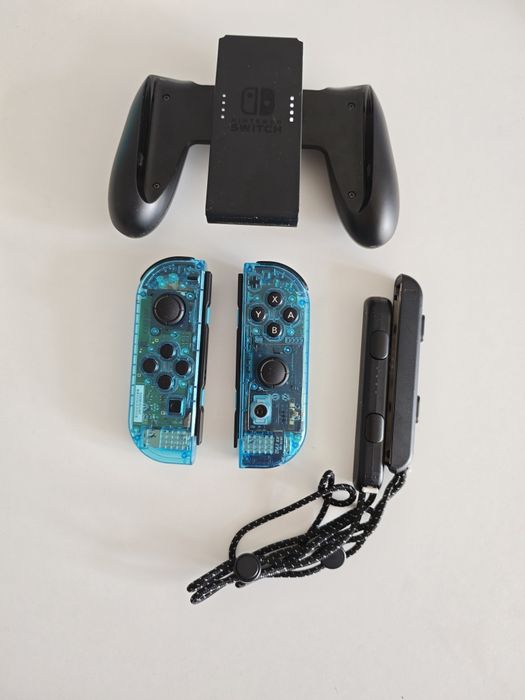 Joycon Blue Transparent + Grip + Strapy