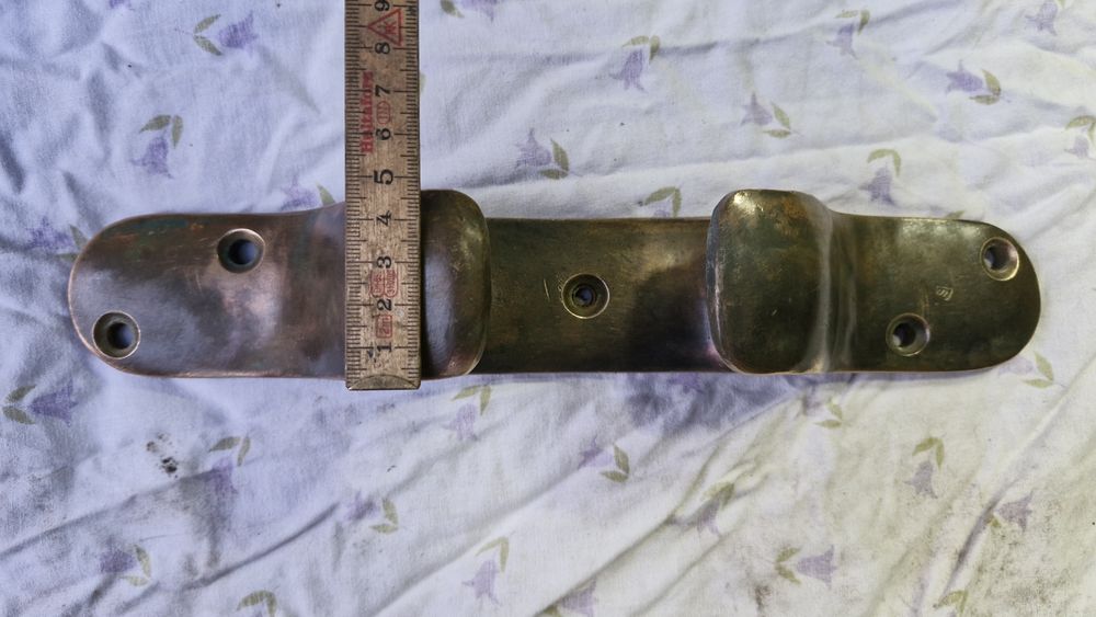 Zabytkowa półkluza mosiężna