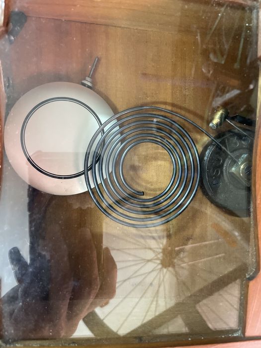 Relogio de parede de corda