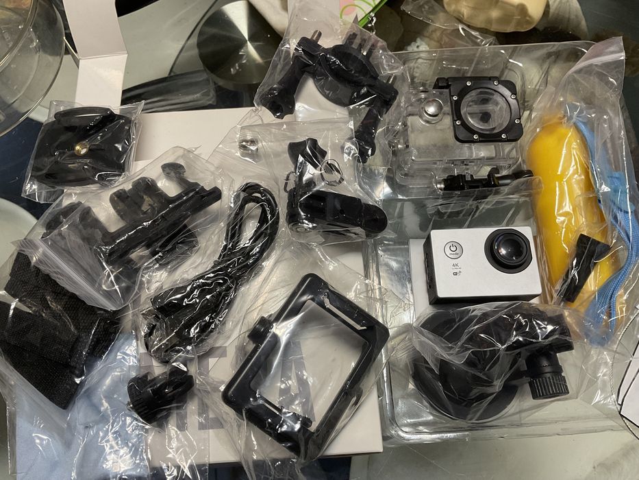 Action camera com acessórios