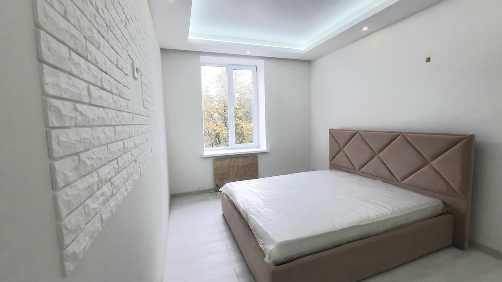 Продам 2 кв по Сертификату,VIP класса АО сталинка пр-ктСвободы 55000$