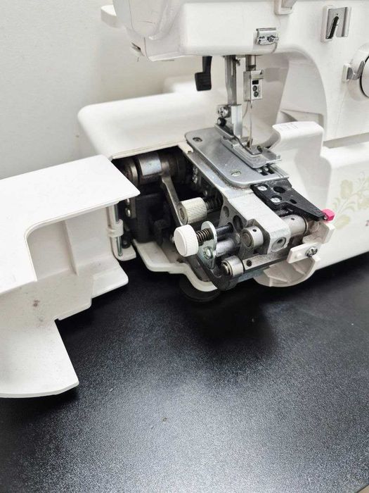Оверлок Janome 210d