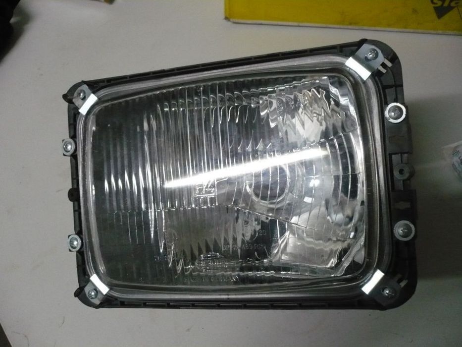 Farol Mercedes 407 - Original