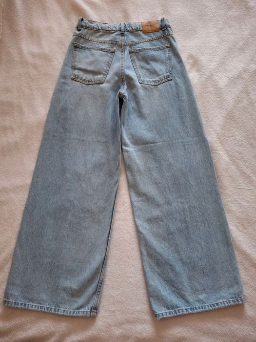 Джинсы wide leg с эффектом потертостей ZARA