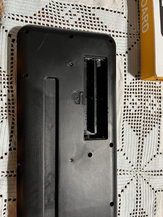Piano elétrico com 32 teclas