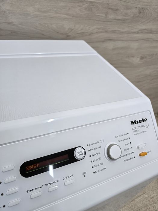 Вертикальна машина Miele W693 Топ.стан Укр.мова