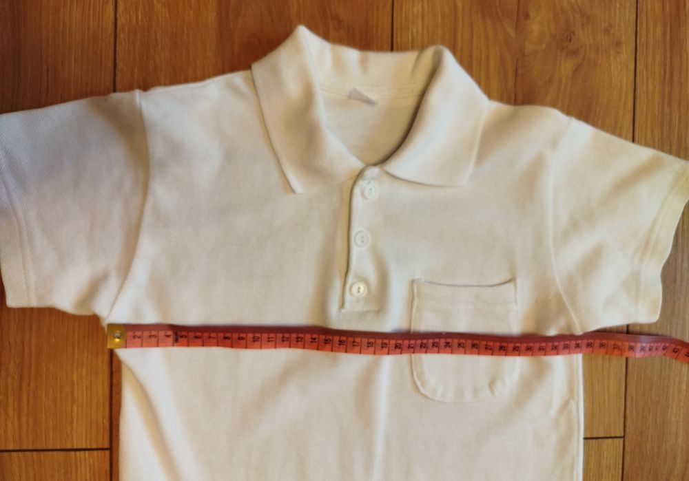 Biała koszulka polo dla chłopca