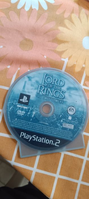 Jogos PS2 + adaptador para colocar PS2 em pé  + discos para jogos piratas