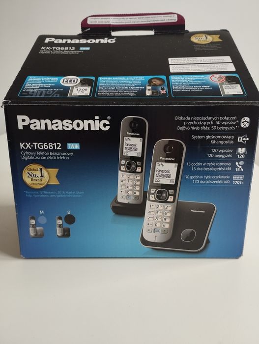 Telefon cyfrowy Panasonic z dwiema słuchawkami.