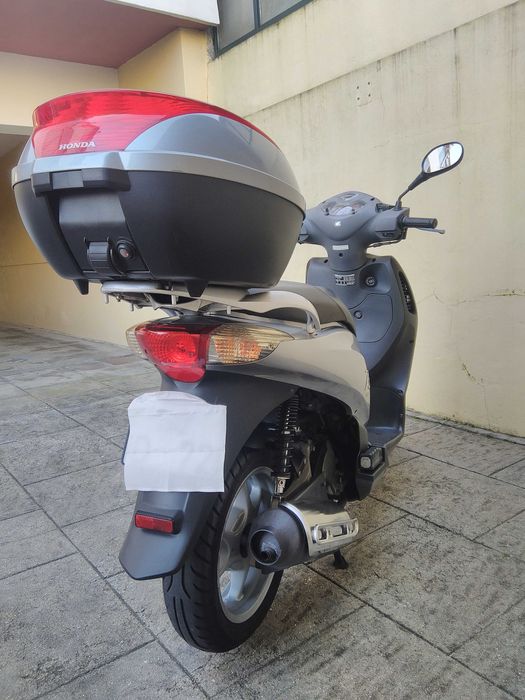 Honda PS 125i impecável.