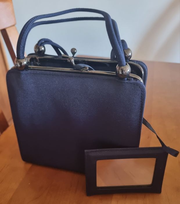 Pochette com espelho