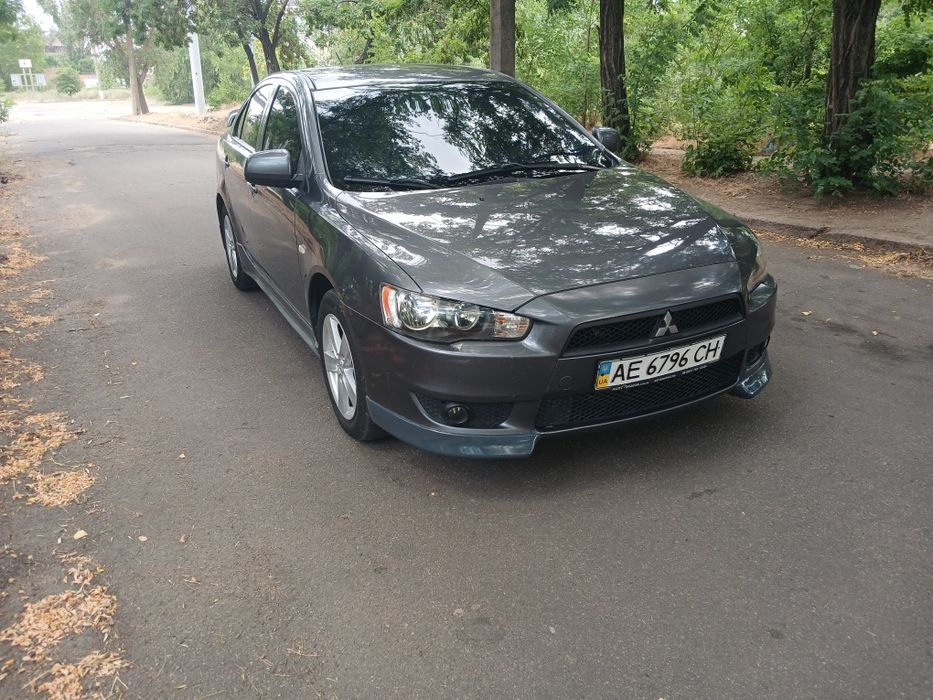 Продам lancer 2.0 акпп газ /бензин