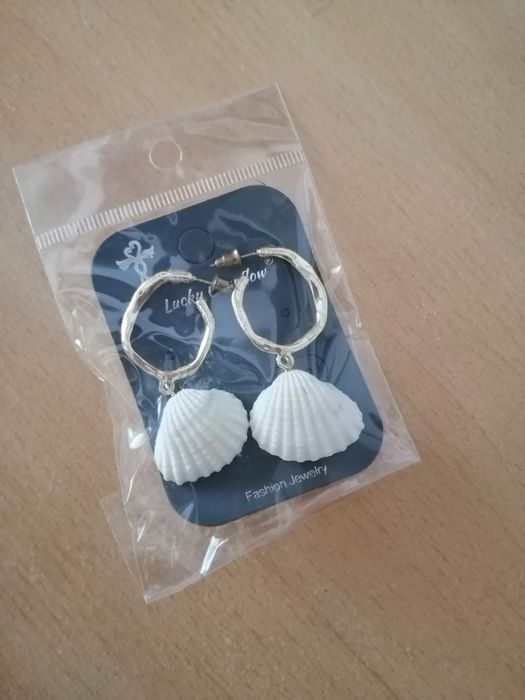 Brincos de senhora novos