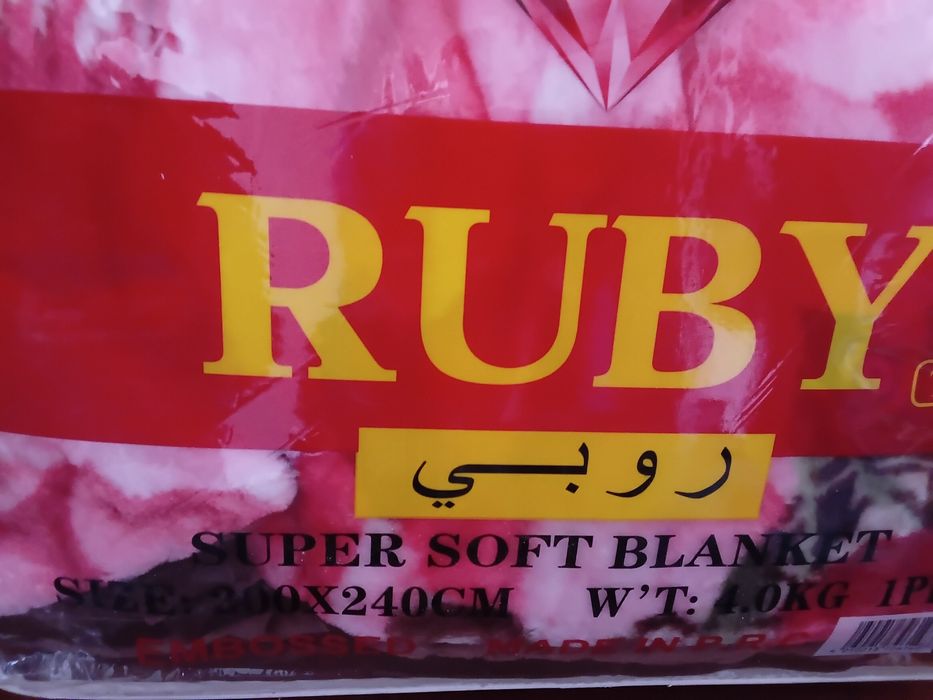 Ковдра або плед тепле