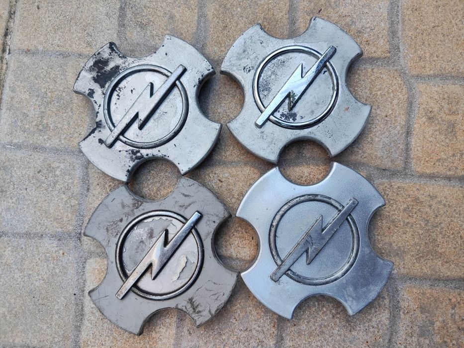 Tampões centro de jantes Opel Tigra