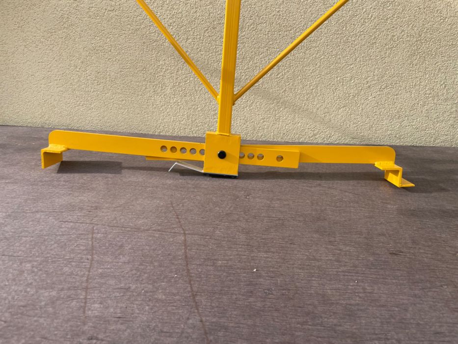 Продольний захват для встановлення бордюрів, плит