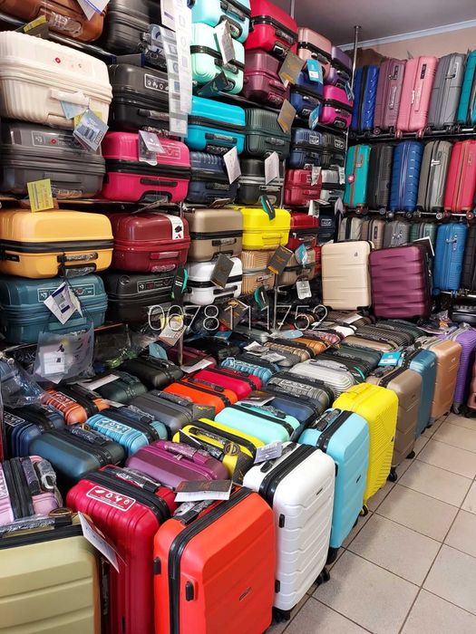 МАГАЗИН - СКЛАД валізи чемоданы сумки на колесах ручна поклажа рюкзаки