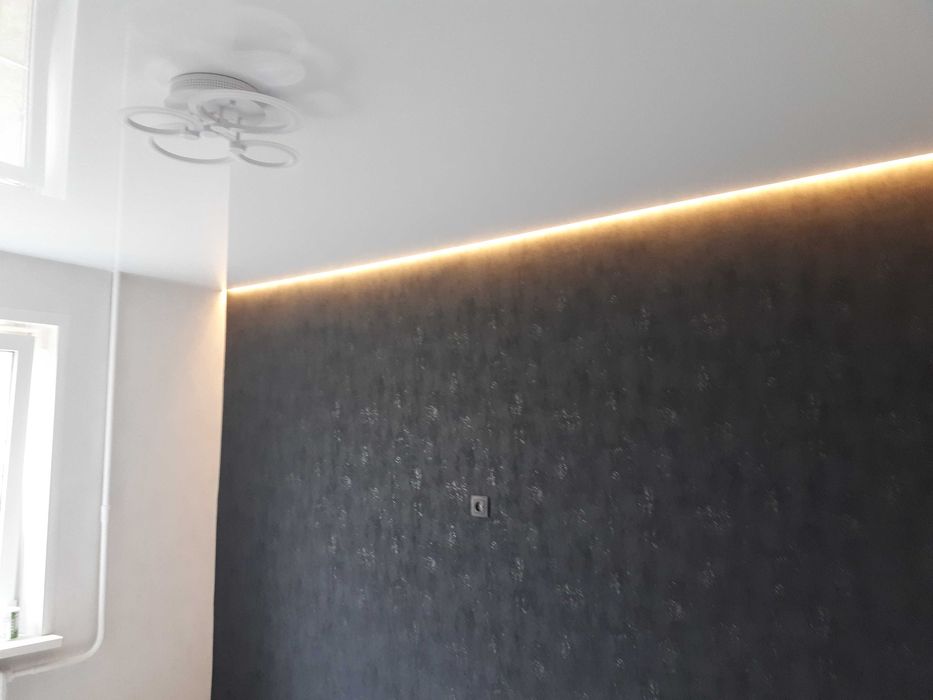 Натяжные потолки  отделочные работы