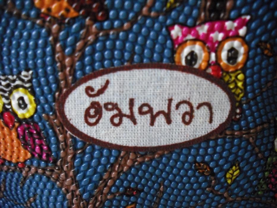 Bolsa tailandesa com mochos