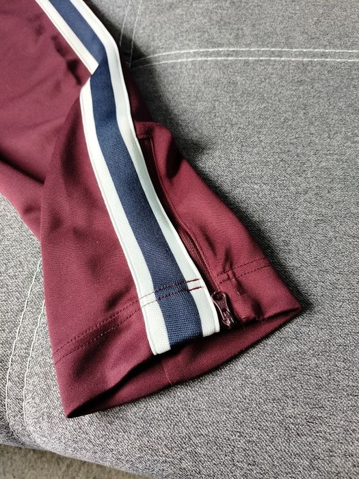 Burgundowe spodnie dresowe męskie Nike rozmiar S
