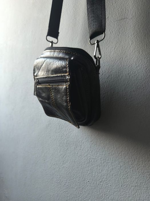 Bolsa de cabedal...