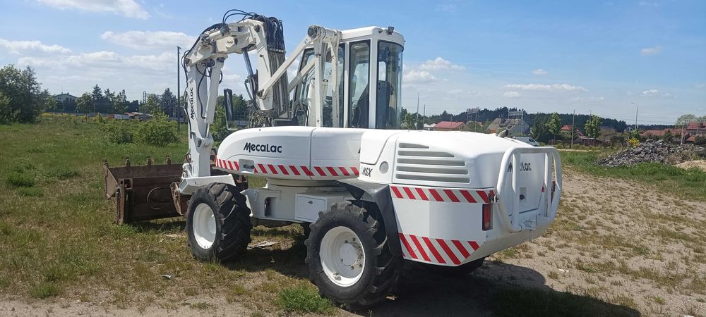 Wynajmę koparko-ładowarkę mecalac 12 msx