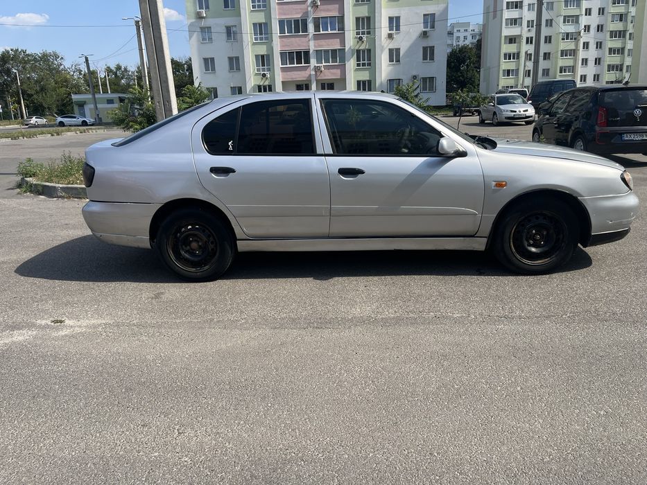 Nissan Primera 2002 VIN SJNFEAP11U0610180 фото оголошення 4 з 8