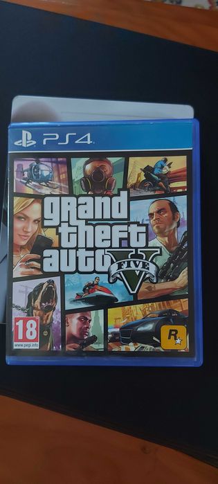 PS4 Pro 1TB + comando original + 4 jogos