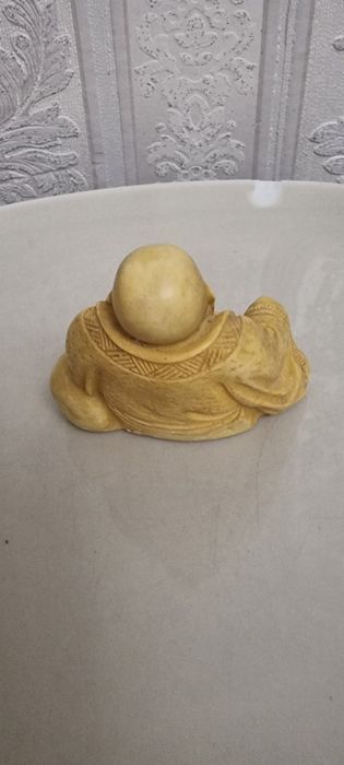 Статуетка Будди .