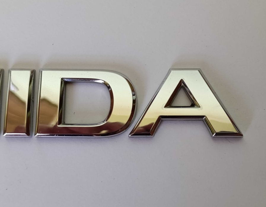 Napis emblemat Nissan Tiida I 04-12r