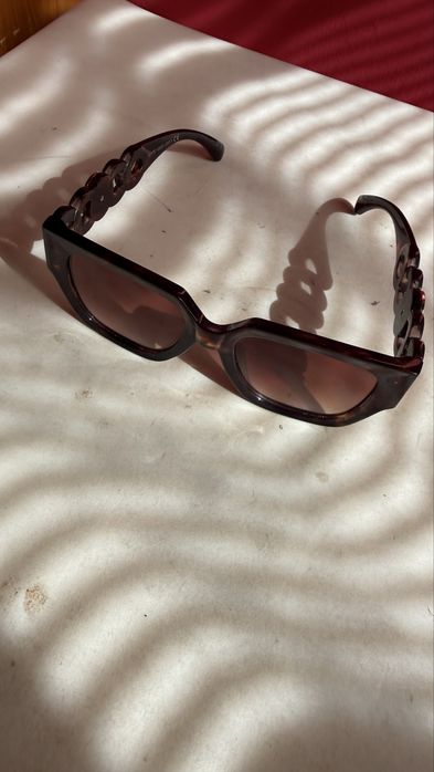Oculos novos  versage o
