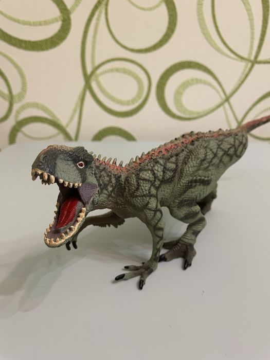 Динозавр іграшка