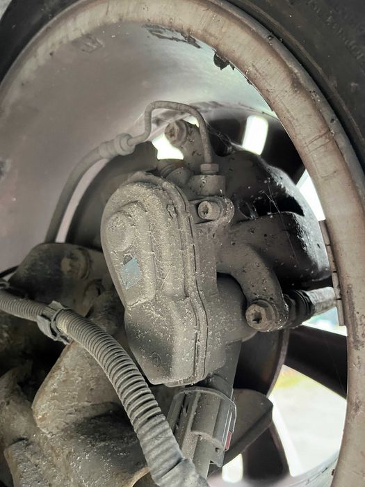 Zacisk Hamulca ręcznego elektryczny tył Renault Scenic 3