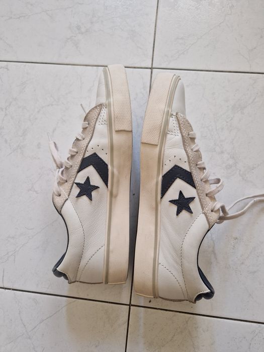 All star branco com notas de azul